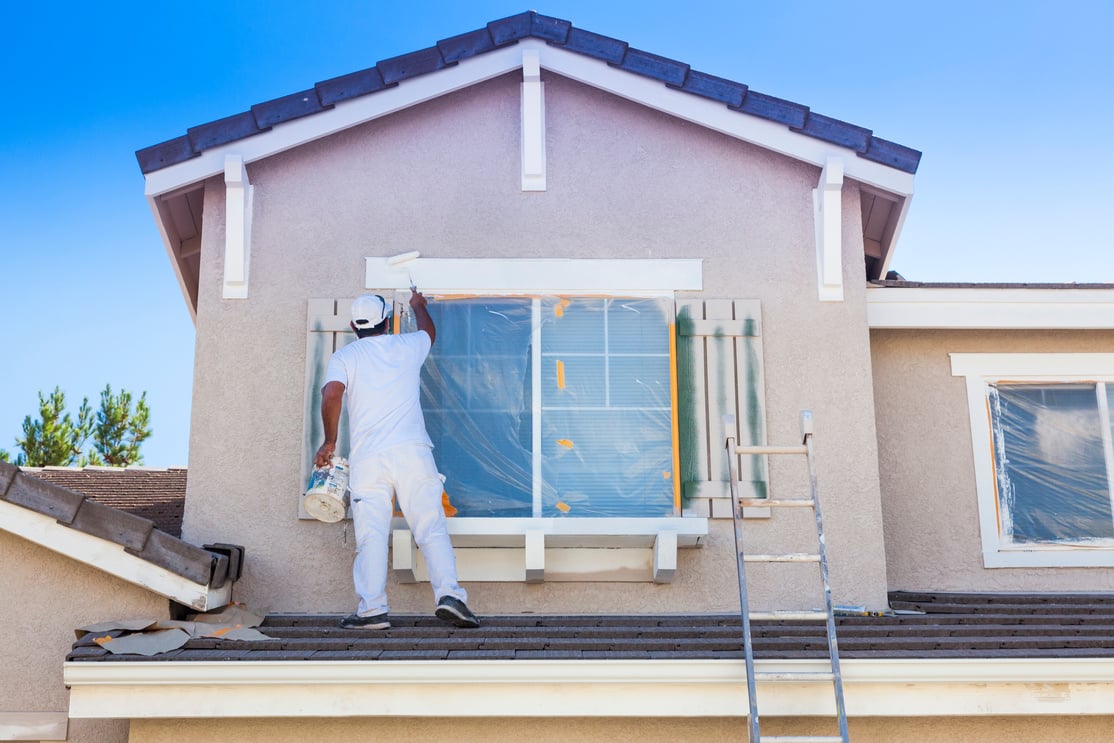 House Painter Painting the Trim